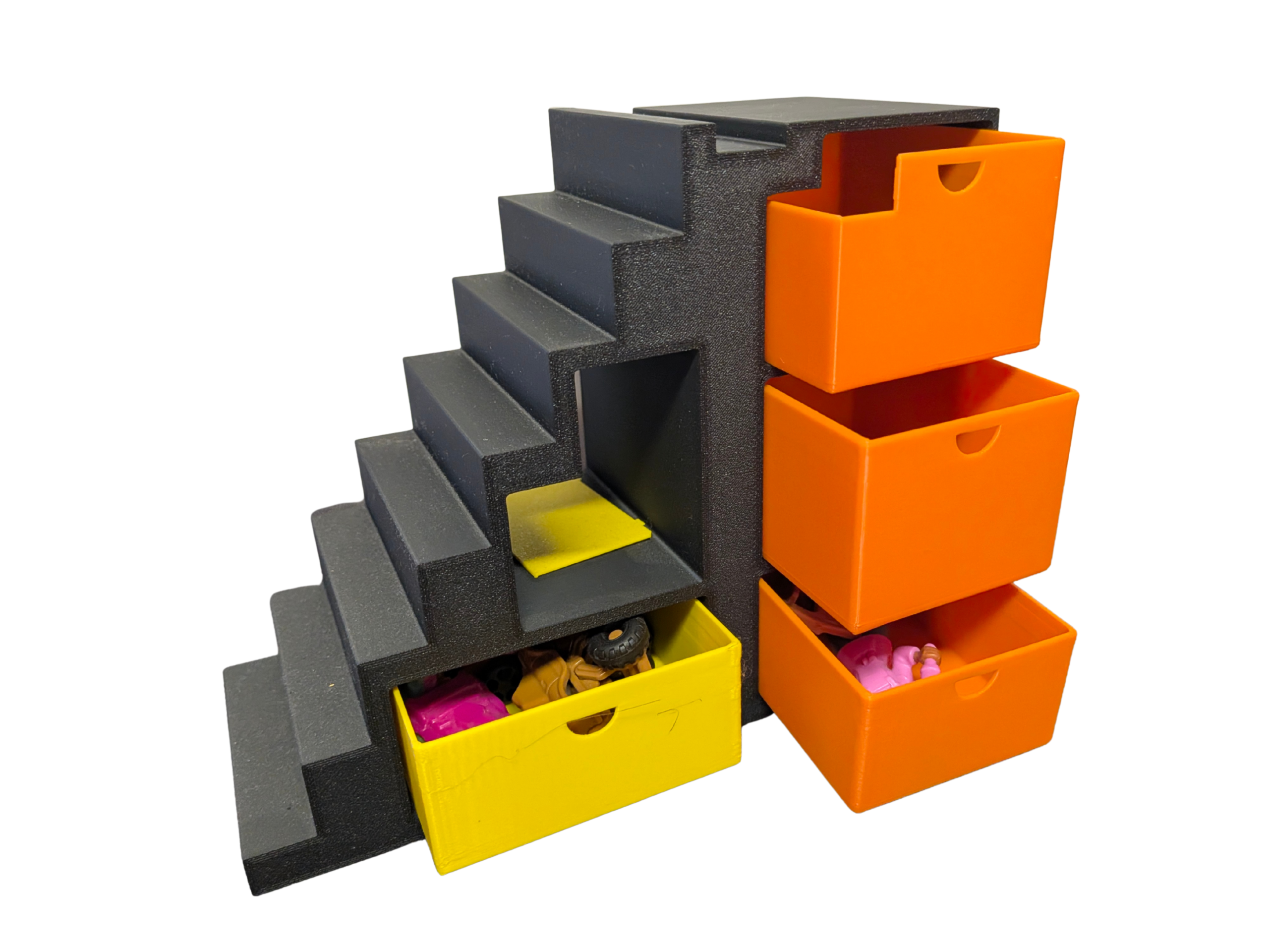 Modern 3D printed dollhouse staircase in grey with yellow and orange pull-out storage drawers for miniature accessories.